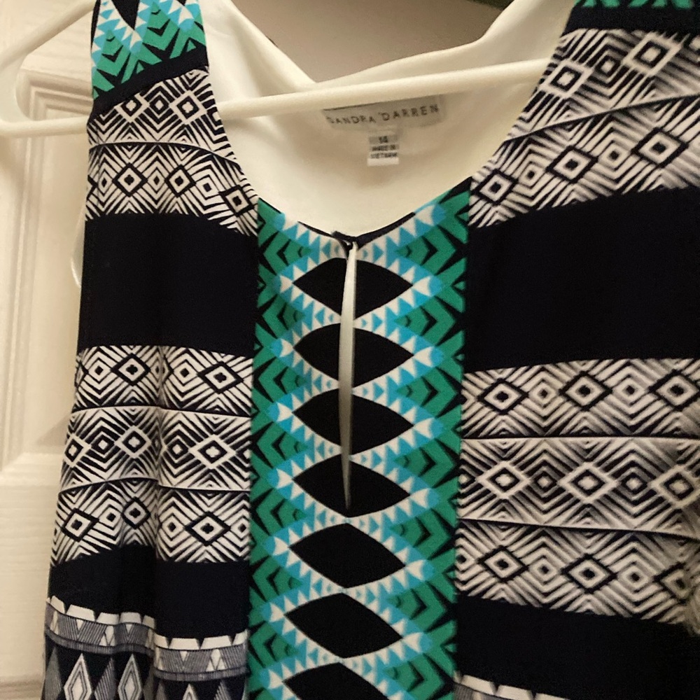 Floor length size 14 sleeveless dress. Sandra Darren make. Wore once.